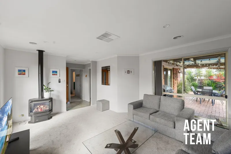 Living room with gas fireplace at 15/74 Britten-Jones Drive, Holt