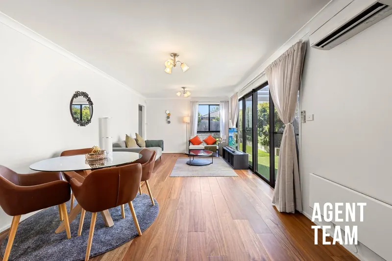 Open-plan dining and living at 27 Jean Macnamara Street, Macgregor