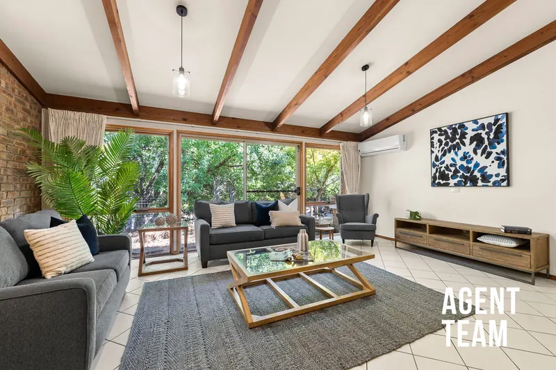 Living room with timber beams at 3 Littler Place, Banks