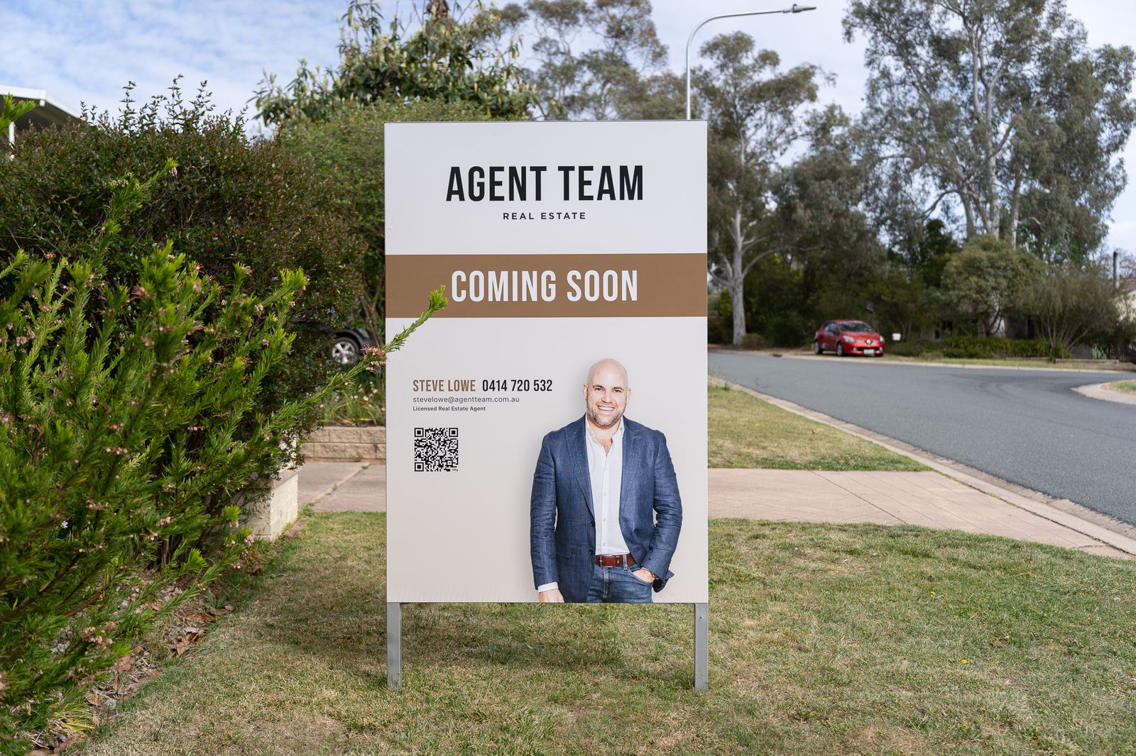 An Agent Team coming soon signboard outside a Canberra home