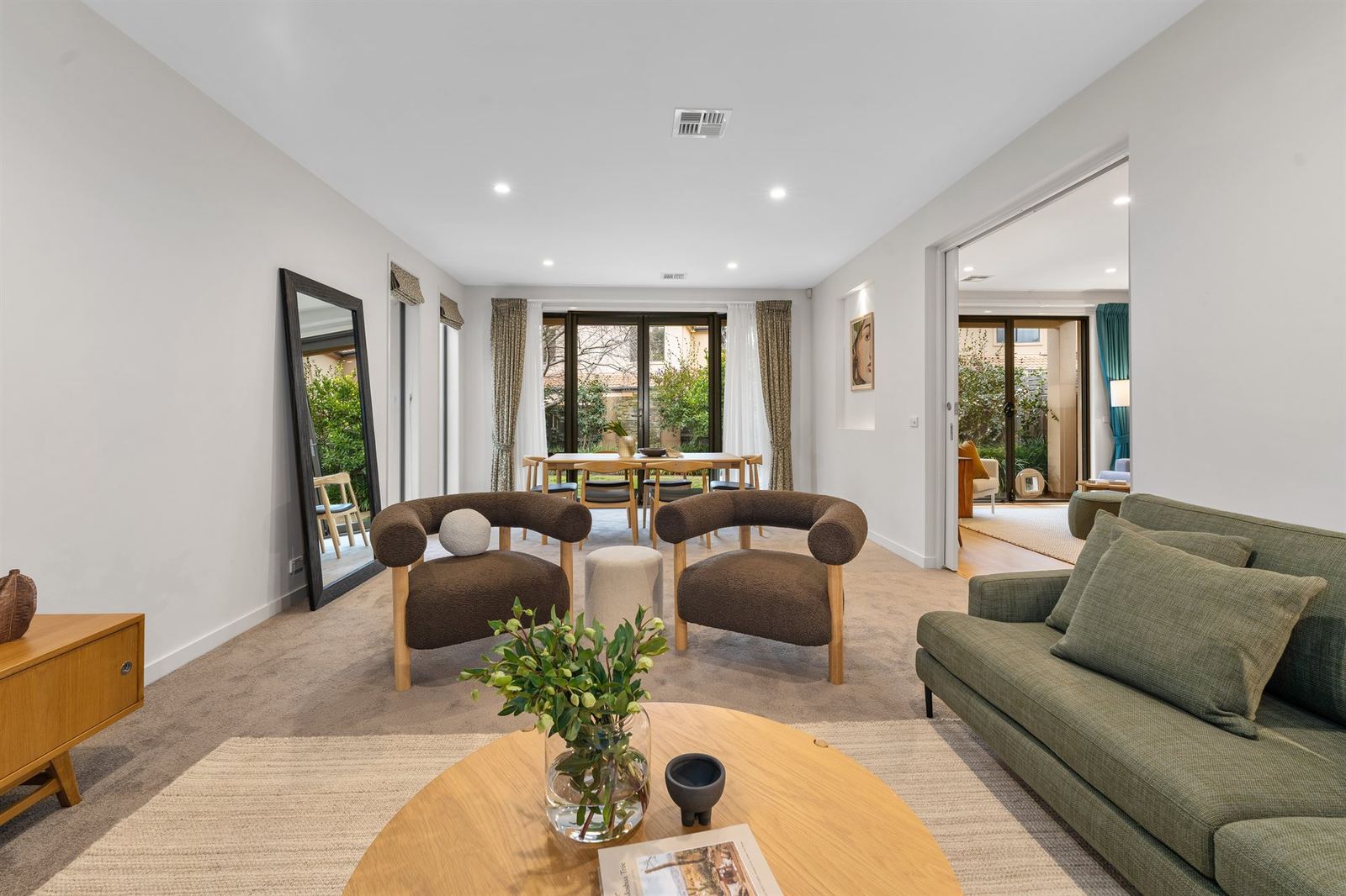 A styled open-plan living room in a Canberra family home