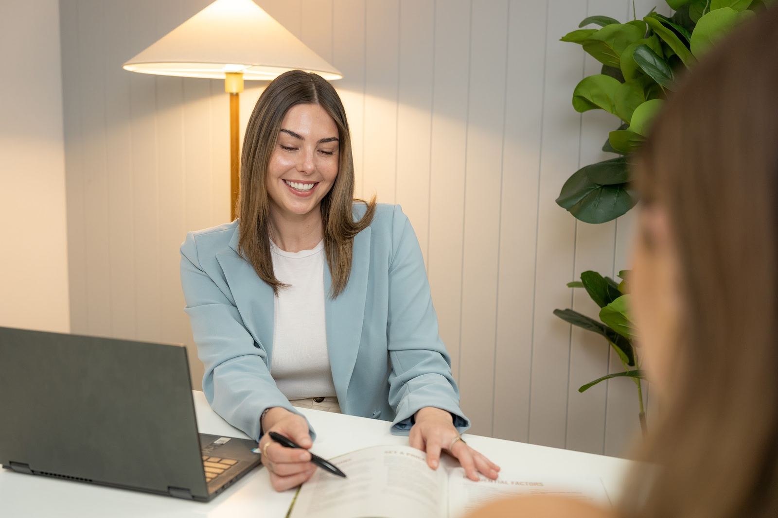 An Agent Team agent going through pricing with a client