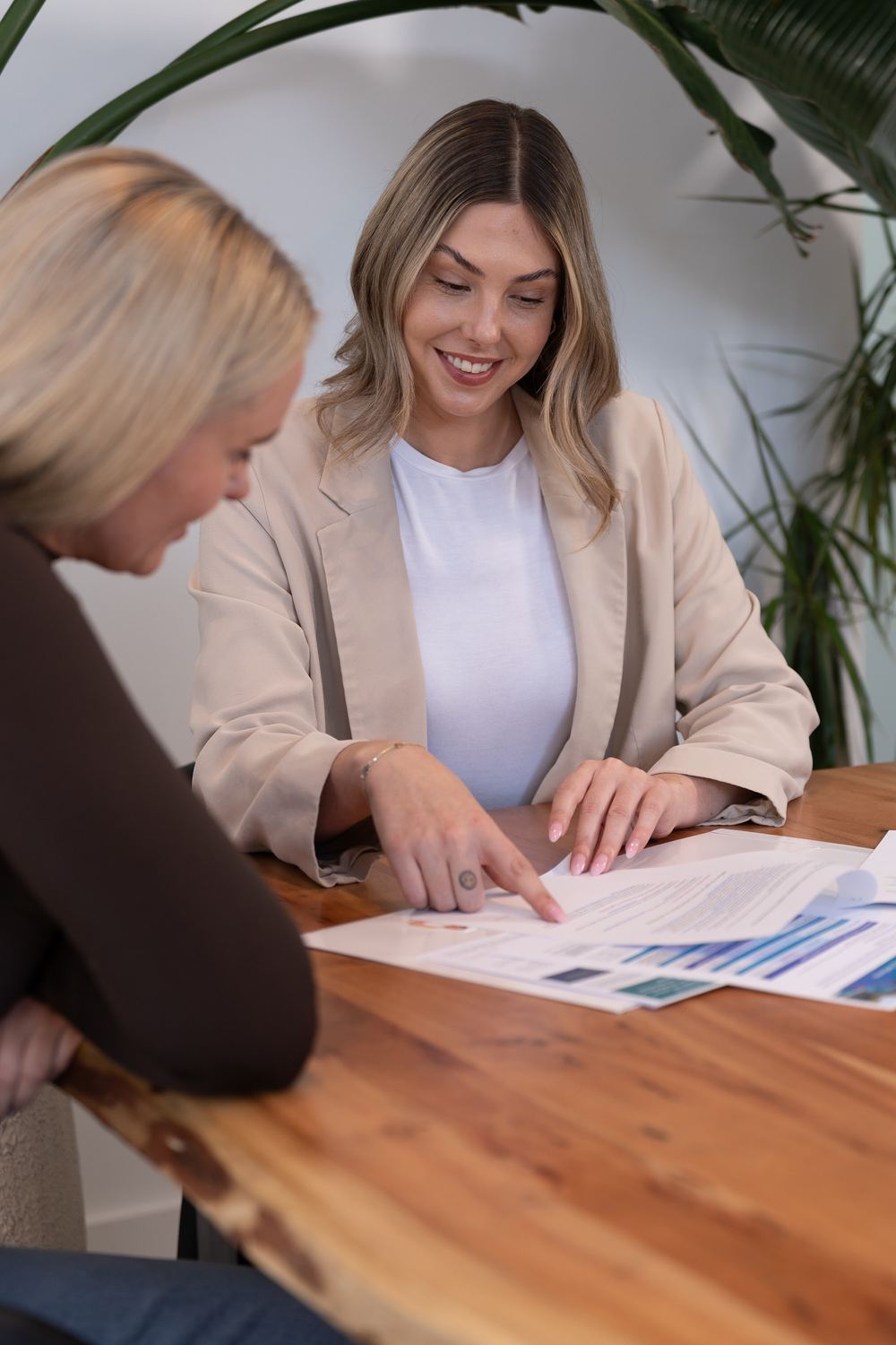 Victoria McLaughlin of Agent Team walking a client through a marketing plan
