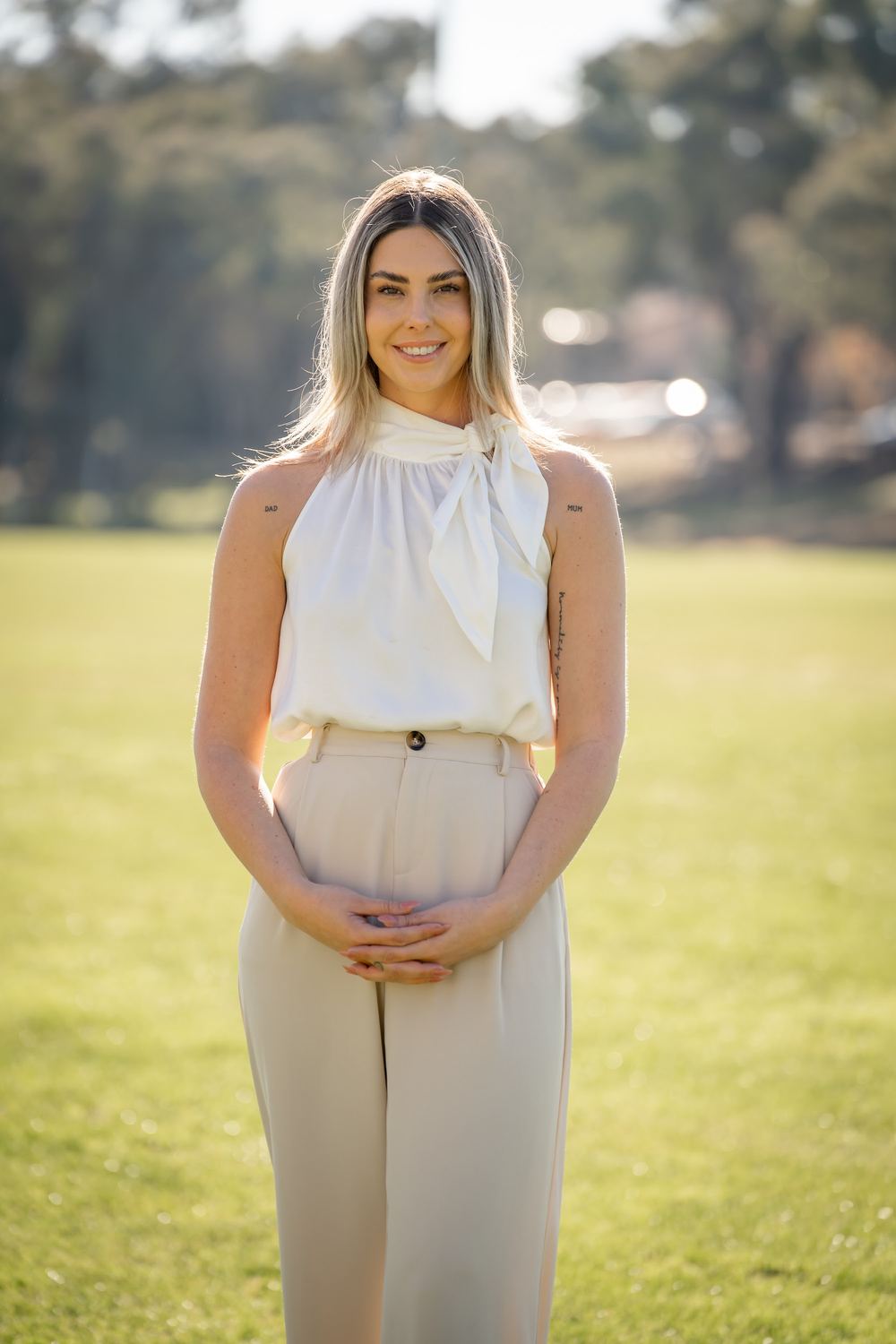 Victoria McLaughlin of Agent Team seated in a styled Canberra lounge